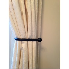  A Pair of Black Wrought Iron Tie Backs with Ball Ends